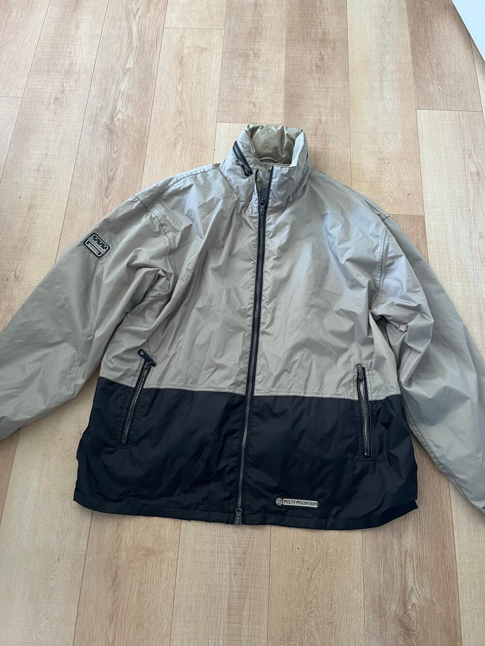 Misty Mountain grey and black waterproof jacket with full zip and zip pockets
